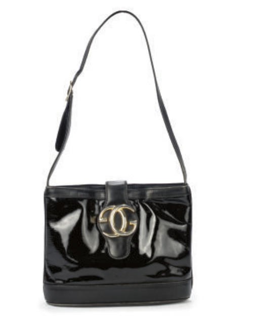 GUCCI, A PATENT HANDBAG, 1972