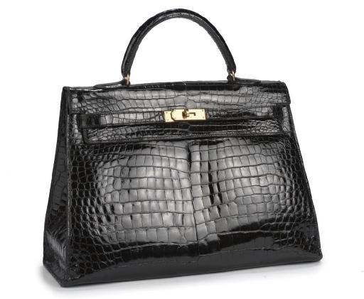 HERMÈS, A BLACK CROCODILE KELLY BAG