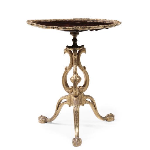 A MAHOGANY AND GILT-MAHOGANY TRIPOD TABLE