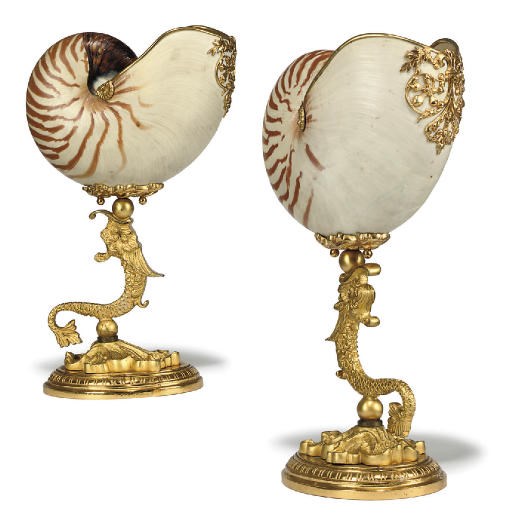 A PAIR OF GILT-METAL MOUNTED NAUTILUS SHELLS
