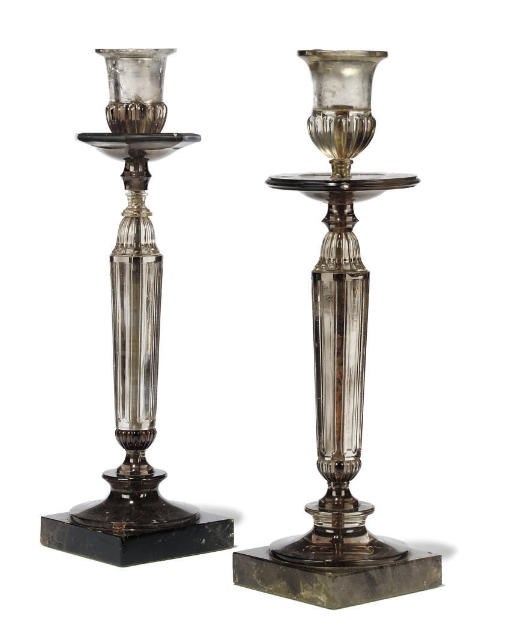 A MATCHED PAIR OF ROCK CRYSTAL AND QUARTZ CANDLESTICKS