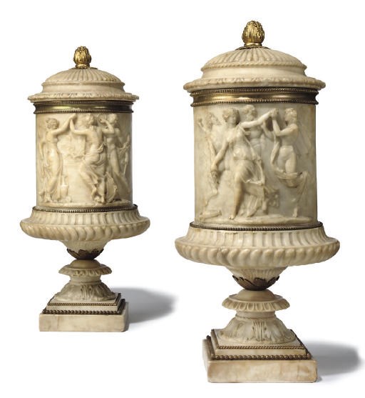 A PAIR OF ITALIAN GILT-BRONZE MOUNTED ALABASTER URNS AND COVERS
