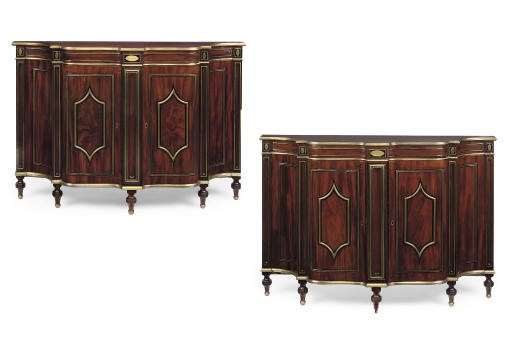 A PAIR OF REGENCY BRASS-MOUNTED EBONY INLAID AND MAHOGANY BREAKFRONT SIDE CABINETS