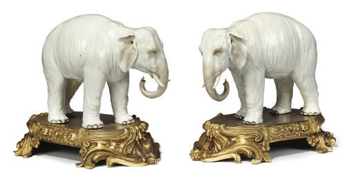 A PAIR OF CONTINENTAL PORCELAIN ORMOLU-MOUNTED MODELS OF WHITE ELEPHANTS
