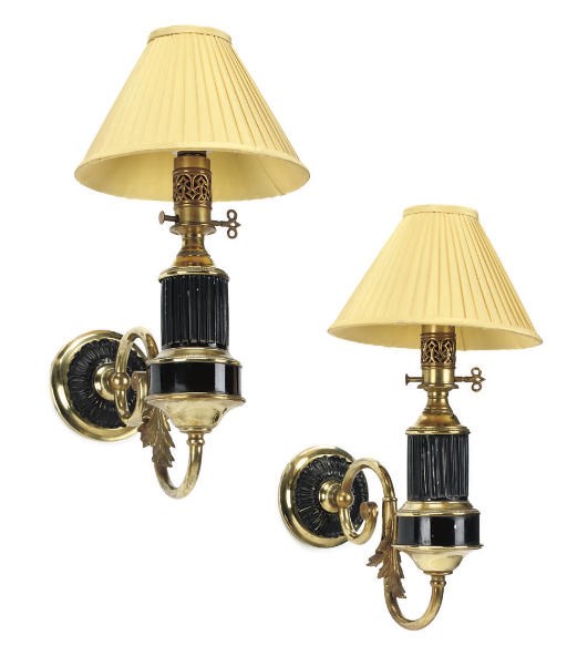 A PAIR OF NAPOLEON III LACQUERED BRASS AND PATINATED SINGLE-LIGHT WALL APPLIQUÉS