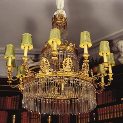 A NORTH EUROPEAN GILTWOOD AND GILT-LEAD TWELVE LIGHT CHANDELIER