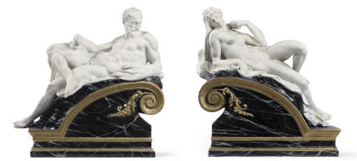 A PAIR OF PARCEL-GILT, PAINTED AND SIMULATED MARBLE PLASTER GROUPS