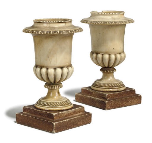 A PAIR OF IVORY CAMPAGNA URNS