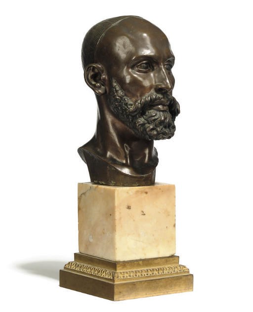 A FRENCH BRONZE BUST OF A BEARDED MAN