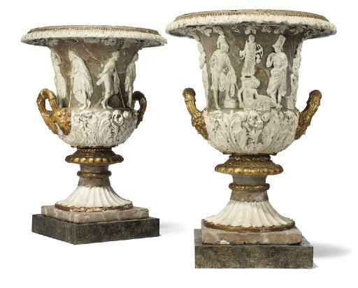 A PAIR OF ITALIAN PARCEL-GILT PLASTER MODELS OF THE MEDICI VASE