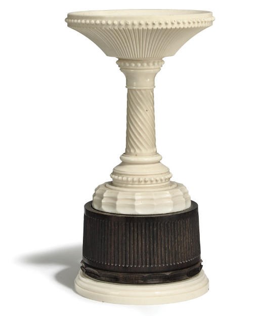 A VICTORIAN ORNAMENTALLY-TURNED IVORY AND EBONY TAZZA