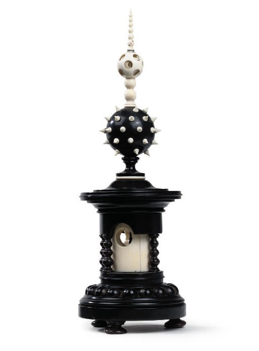 A VICTORIAN IVORY AND EBONISED TABLE ORNAMENT