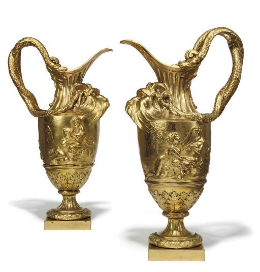 A PAIR OF ORMOLU ORNAMENTAL EWERS