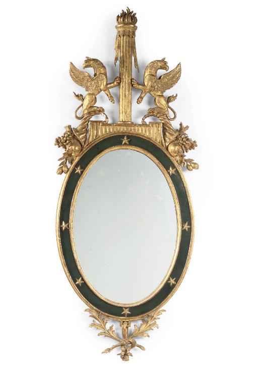 AN ITALIAN GILTWOOD AND BLACK-PAINTED MIRROR