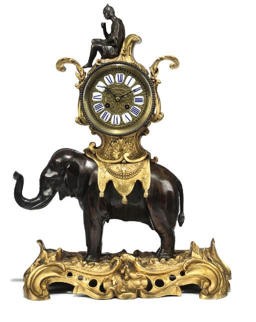 A LOUIS XVI STYLE ORMOLU AND BRONZE STRIKING ELEPHANT CLOCK
