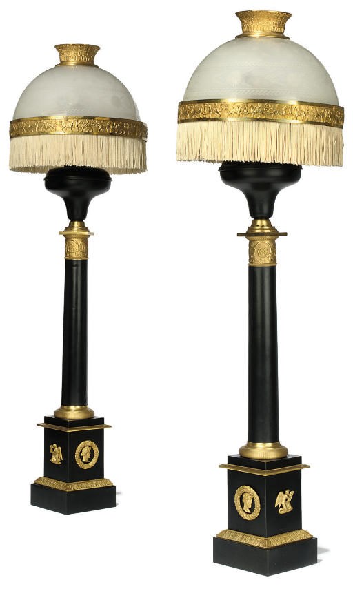 A PAIR OF RESTAURATION GILT-BRASS MOUNTED PATINATED BRONZE OIL LAMPS
