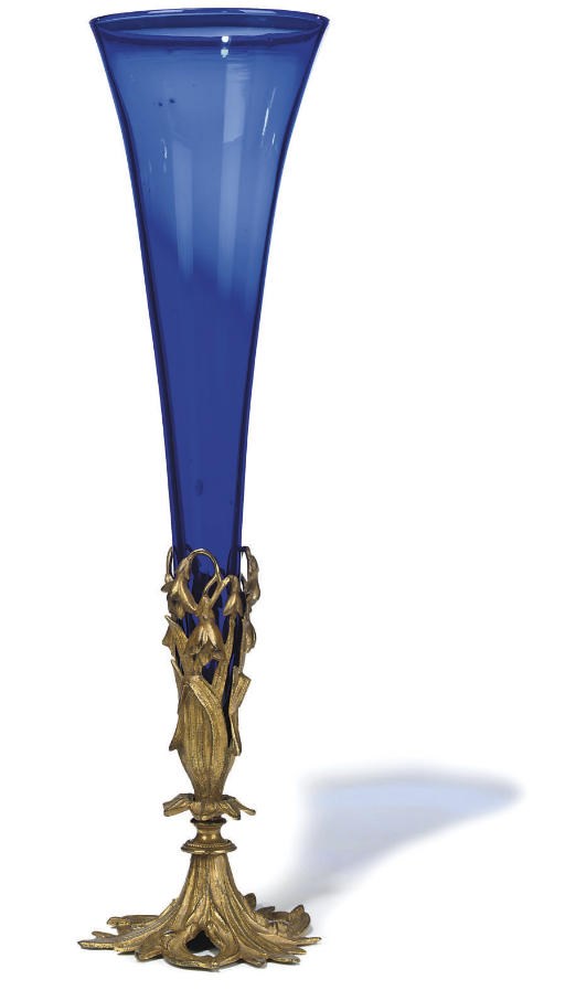 A GILT-METAL MOUNTED BLUE GLASS TRUMPET VASE