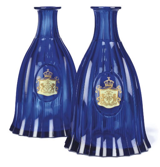 A PAIR OF CONTINENTAL BLUE GLASS MAGNUM DECANTERS