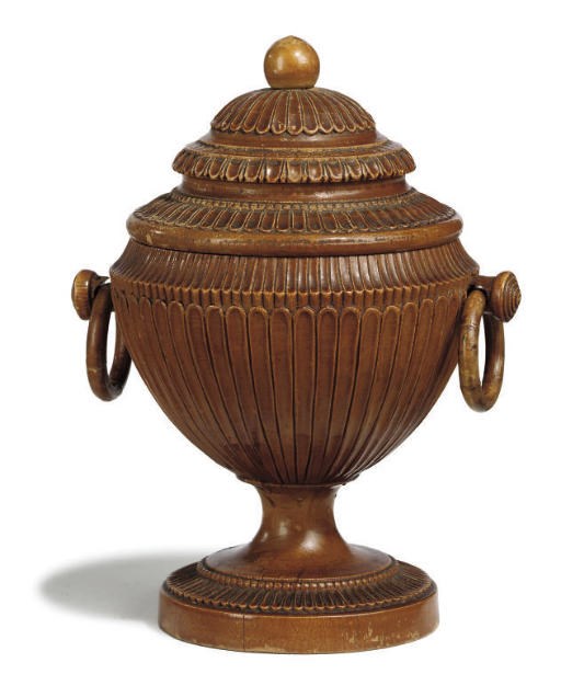 A FRENCH FRUITWOOD URN AND COVER