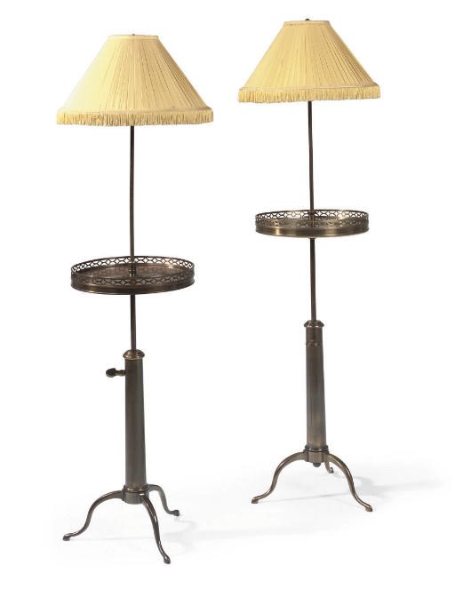 A PAIR OF FRENCH LACQUERED BRASS AND MAHOGANY ADJUSTABLE STANDARD LAMP TABLES