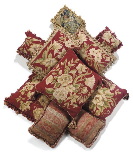 NINE VARIOUS GROS-POINT FLORAL NEEDLEWORK CUSHIONS AND TWO PAISLEY- PATTERNED COTTON CUSHIONS