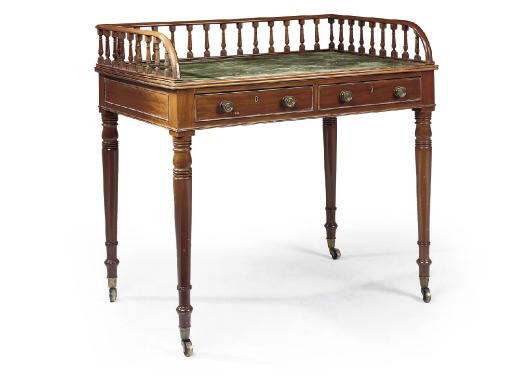 A LATE REGENCY MAHOGANY WRITING-TABLE