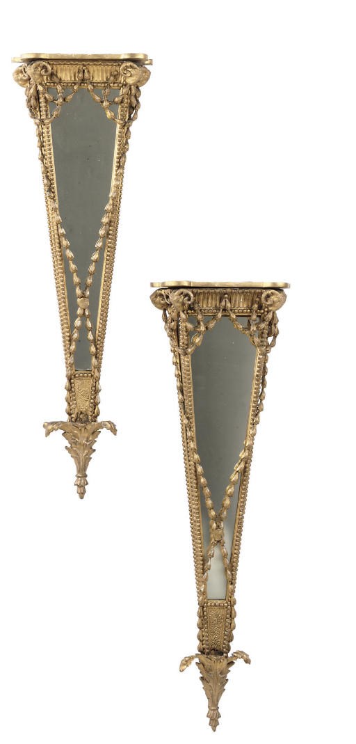 A PAIR OF VICTORIAN GILTWOOD AND GILT COMPOSITION MIRRORED WALL BRACKETS