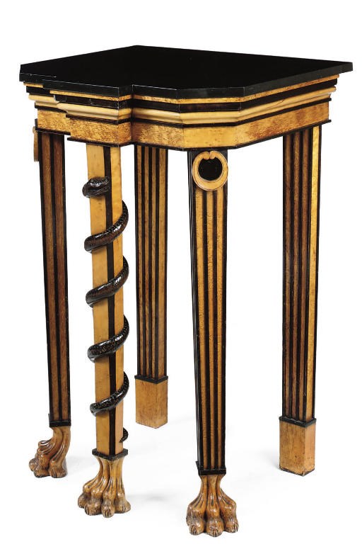 A BIEDERMEIER BIRD'S-EYE MAPLE AND PART-EBONISED SIDE TABLE