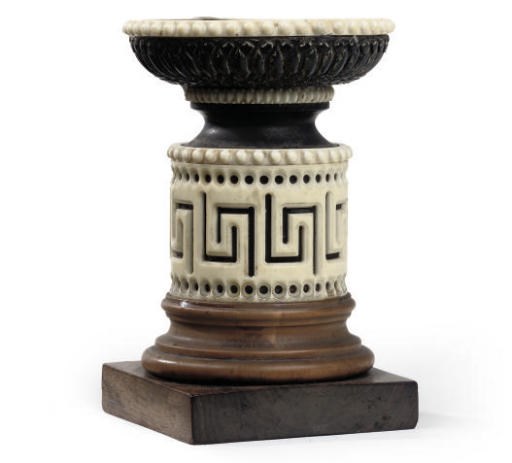 A VICTORIAN IVORY, EBONY AND ROSEWOOD CANDLESTICK