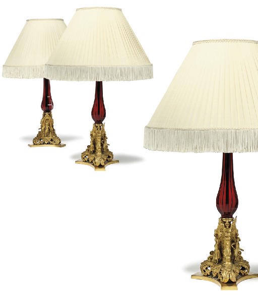 THREE FRENCH GILT-BRONZE AND RUBY GLASS TABLE LAMPS