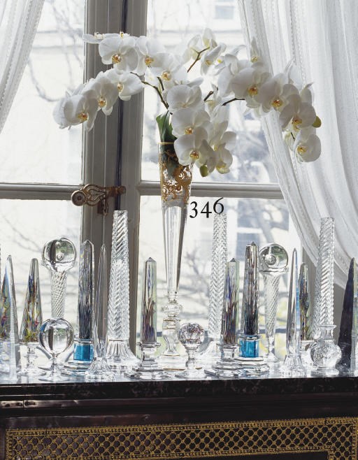 A FRENCH GLASS VASE OF TALL SLENDER FLARED FORM