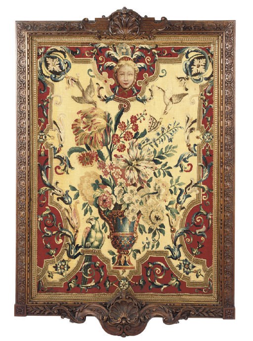 A LOUIS XIV BEAUVAIS TAPESTRY PANEL IN A CARVED WALNUT FRAME