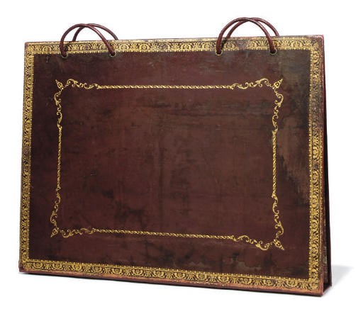 A LARGE GILT-TOOLED RED LEATHER FOLIO