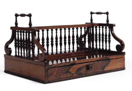A REGENCY ROSEWOOD TABLE BOOKSTAND