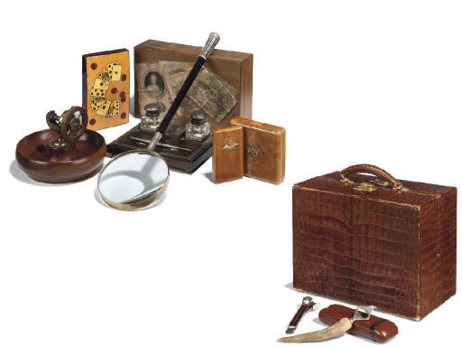 A CROCODILE SKIN TRAVELLING CASE