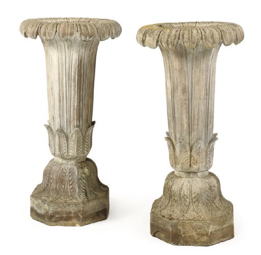 A PAIR OF LARGE COMPOSITE STONE TERRACOTTA GARDEN URNS