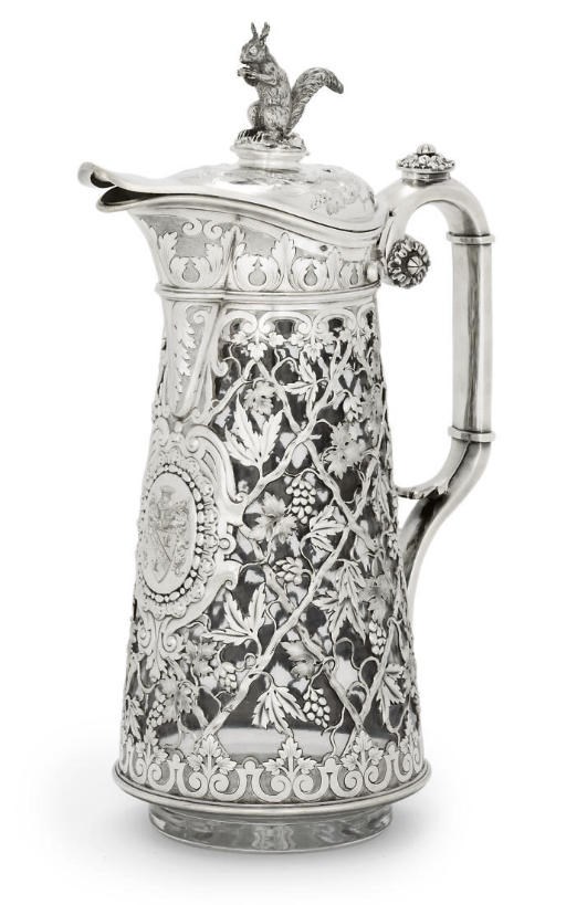 A FRENCH SILVER AND GLASS CLARET JUG