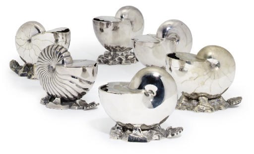 A GROUP OF SIX VARIOUS SILVER-PLATE AND METALWARE SPOON-WARMERS