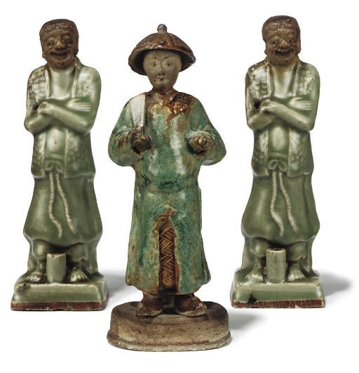 A PAIR OF CHINESE CELADON GLAZED JOSS STICK HOLDERS