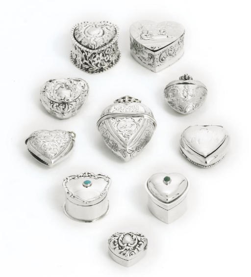 A GROUP OF TEN VARIOUS SILVER BOXES