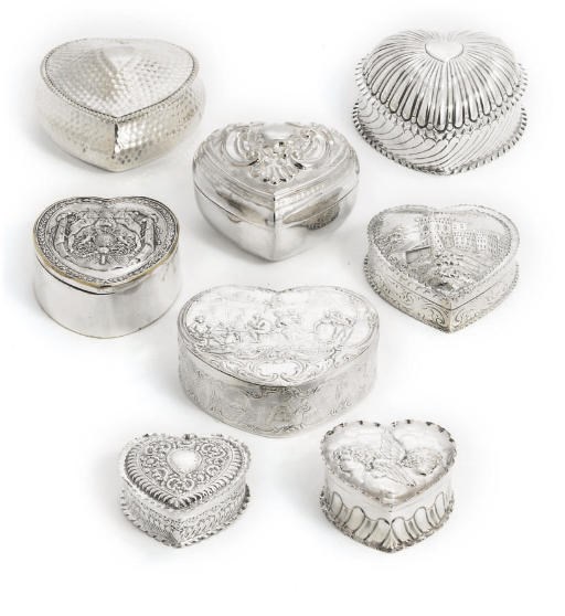 A GROUP OF EIGHT SILVER AND METAL BOXES