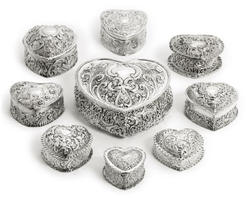 A GROUP OF NINE VARIOUS SILVER BOXES