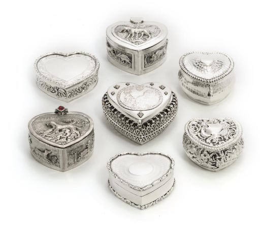 A GROUP OF SEVEN VARIOUS SILVER AND METAL BOXES