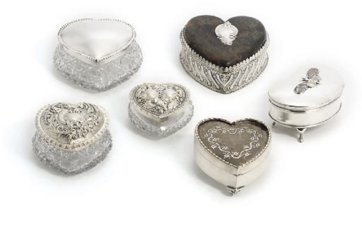THREE SILVER-MOUNTED CUT GLASS BOXES; TWO SILVER AND TORTOISESHELL BOXES AND A SILVER AND MOTHER-OF-PEARL BOX