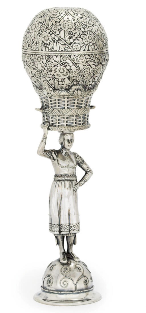 A GERMAN SILVER STANDING CUP AND COVER