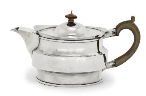A GEORGE III SILVER TEAPOT