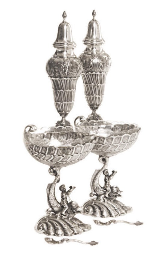 A SET OF FOUR GERMAN SILVER SALT CELLARS AND PEPPER CASTERS AND TWO SILVER-PLATED CASTERS,