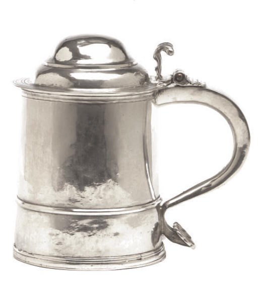A WILLIAM AND MARY SILVER TANKARD WITH HINGED COVER,