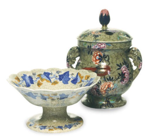 AN ENGLISH CREAMWARE PART SERVICE IN THE 'GRAPEVINE' PATTERN AND A PEARLWARE OLIVE GROUND FOOTED COMPOTE AND POT POURRI JAR AND PIERCED COVER IN THE 'TUMBLEDOWN DICK' PATTERN,