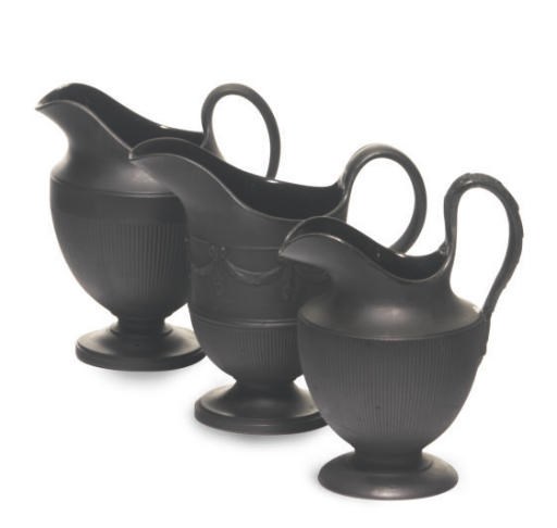 THREE ENGLISH NEOCLASSIC BLACK BASALTES CREAM JUGS,
